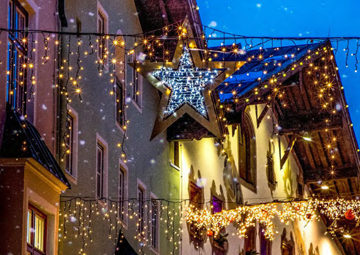 icicle lights across street with star light motifs