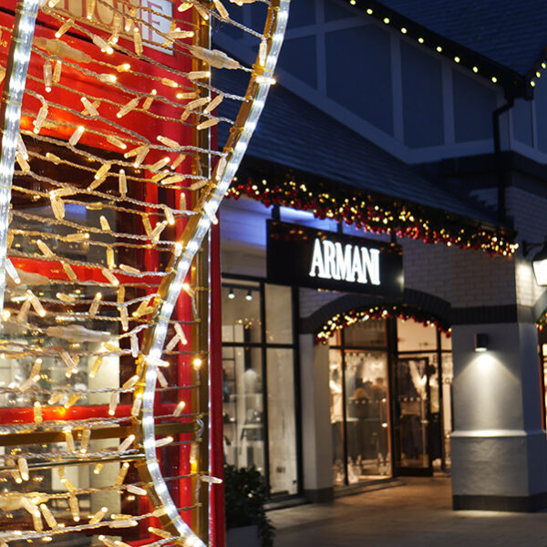 Decorated and illuminated red telephone box at Christmas