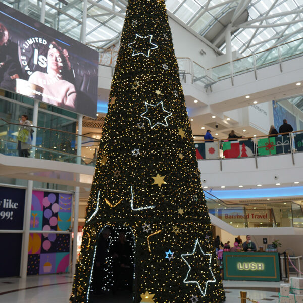huge commercial christmas tree in shopping centre