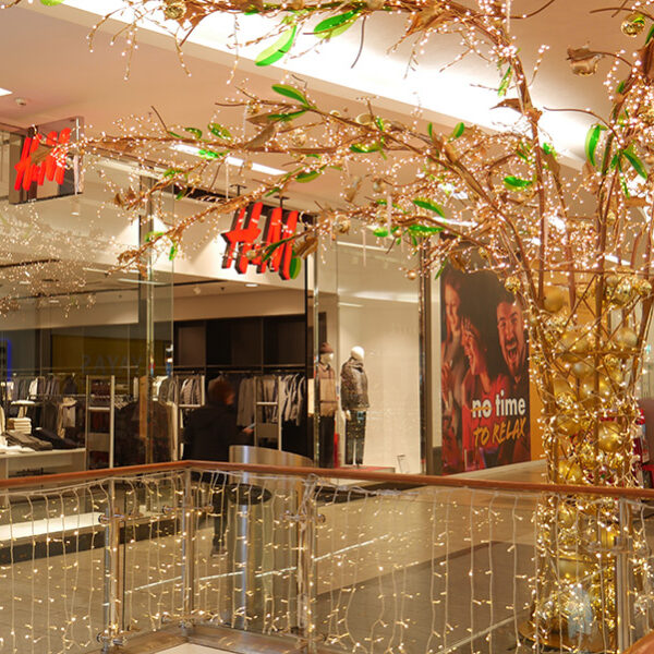 light tree sculptures in shopping centre
