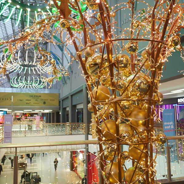 light tree sculptures in shopping centre