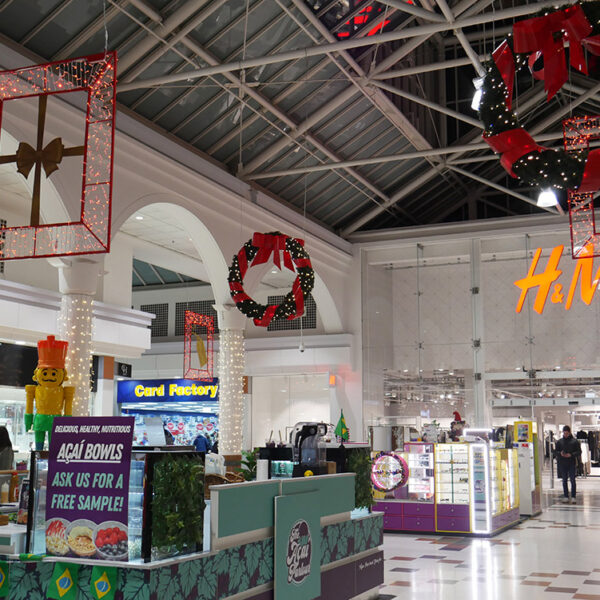 Shopping centre street with Christmas lights and decorations.