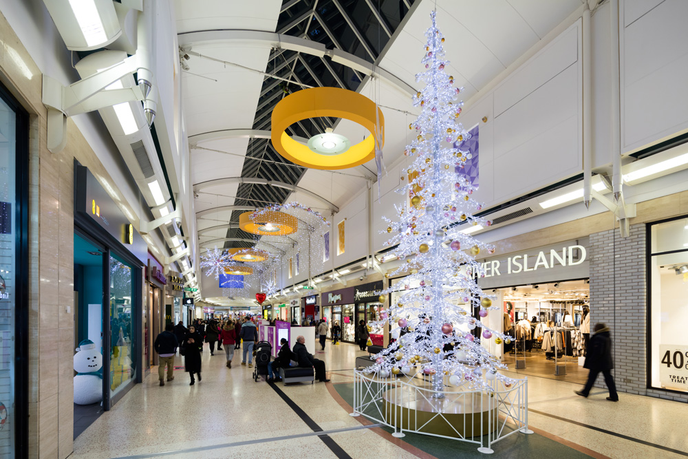 Cool white Illuminated 7 metre Christmas Tree in Shopping Centre